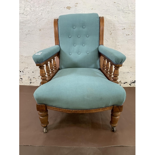 244 - A Victorian mahogany and teal fabric upholstered parlour chair