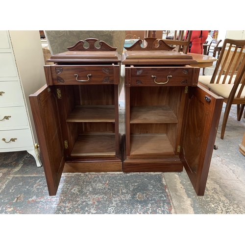 25 - A pair of Victorian style carved mahogany bedside cabinets - approx. 87cm high x 41cm wide x 41cm de... 