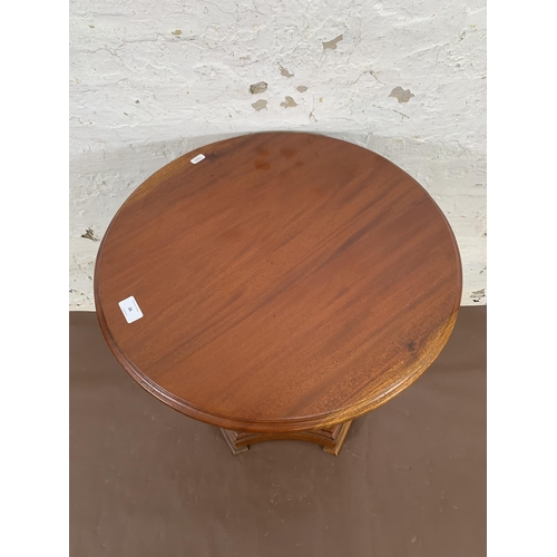 26 - A 19th century style mahogany circular top tripod pedestal side table - approx. 70cm high x 54cm dia... 