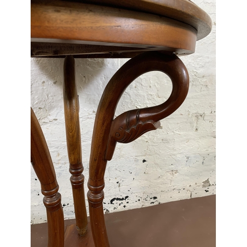 26 - A 19th century style mahogany circular top tripod pedestal side table - approx. 70cm high x 54cm dia... 