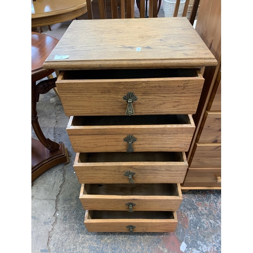 28 - A 1930s oak chest of drawers - approx. 80cm high x 45cm wide x 37cm deep