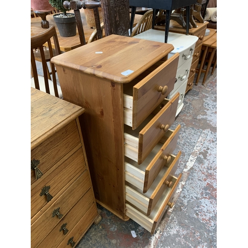 29 - A modern pine chest of drawers - approx. 93cm high x 37cm wide x 31cm deep