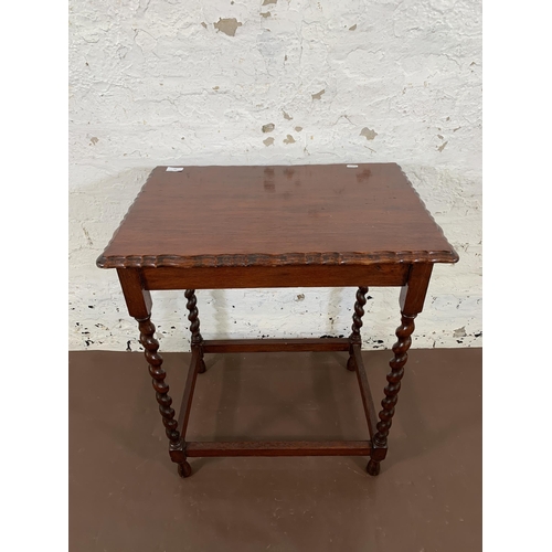 47 - An early 20th century oak pie crust edge side table on barley twist supports - approx. 72cm high x 6... 