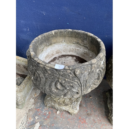 57 - A 19th century style cast stone pedestal garden planter with acanthus leaf design - approx. 52cm hig... 