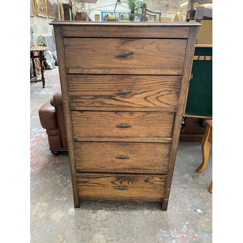 61 - A 1930s oak chest of drawers - approx. 105cm high x 60cm wide x 43cm deep