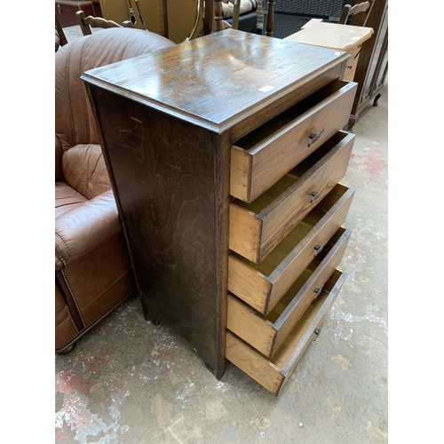 61 - A 1930s oak chest of drawers - approx. 105cm high x 60cm wide x 43cm deep