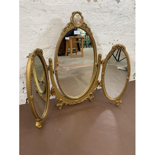 63 - A 19th century style gilt framed triptych dressing table mirror with porcelain cameo - approx. 68cm ... 