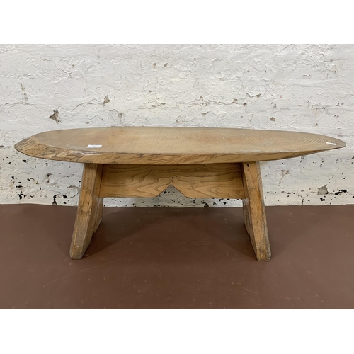 67 - A mid 20th century elm live edge tree slice coffee table - approx. 38cm high x 28cm wide x 103cm lon... 