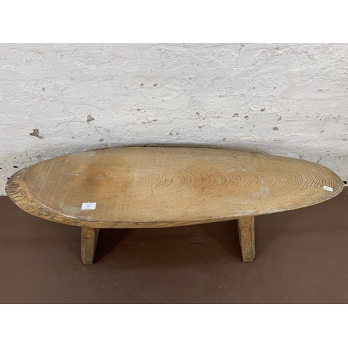 67 - A mid 20th century elm live edge tree slice coffee table - approx. 38cm high x 28cm wide x 103cm lon... 