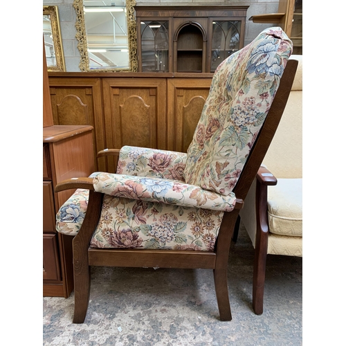 77 - A late 20th century beech and floral fabric upholstered armchair