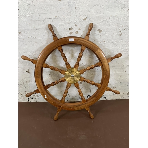 7A - An antique style hardwood ship's wheel wall hanging - approx. 92cm diameter