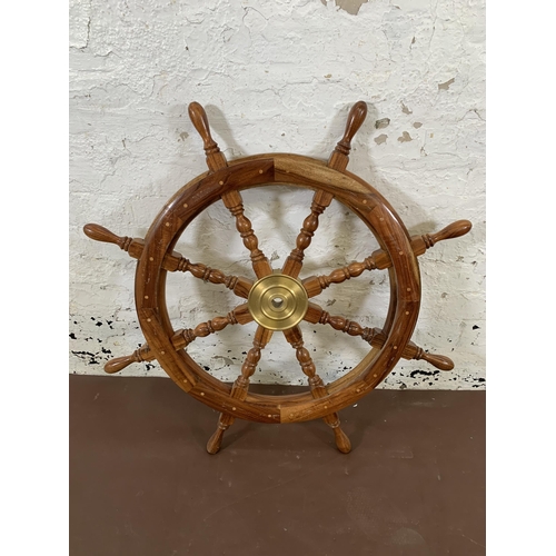 7A - An antique style hardwood ship's wheel wall hanging - approx. 92cm diameter