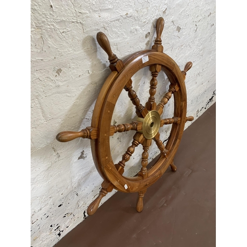 7A - An antique style hardwood ship's wheel wall hanging - approx. 92cm diameter