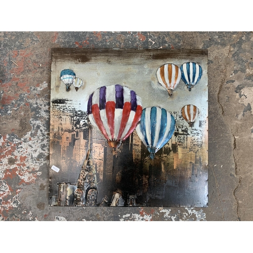 8 - Five items, three wall mirrors, one metal hot air balloon design wall hanging and one The Range canv... 