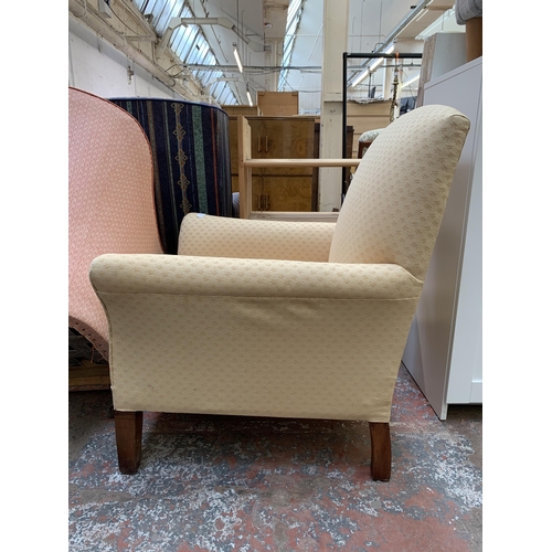 80 - A mid 20th century fabric upholstered armchair