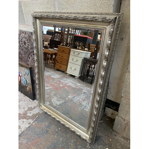 9 - A 19th century style silver painted framed bevelled edge wall mirror - approx. 110cm x 80cm