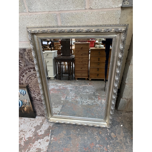 9 - A 19th century style silver painted framed bevelled edge wall mirror - approx. 110cm x 80cm