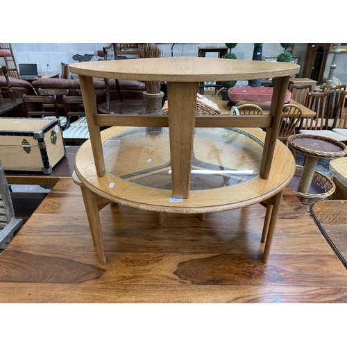 98 - A mid 20th century teak effect nest of tables - approx. 43cm high x 86cm diameter