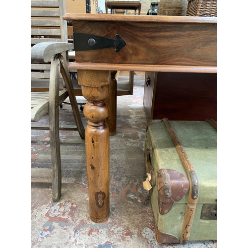 99 - An Indian sheesham wood rectangular dining table - approx. 77cm high x 90cm wide x 145cm long