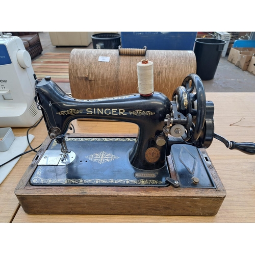 817 - A cased 1922 Singer 99K hand crank sewing machine