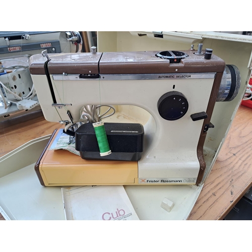 822 - Two sewing machines, one cased Frister + Rossmann Cub 4 compact electric with foot pedal and instruc... 