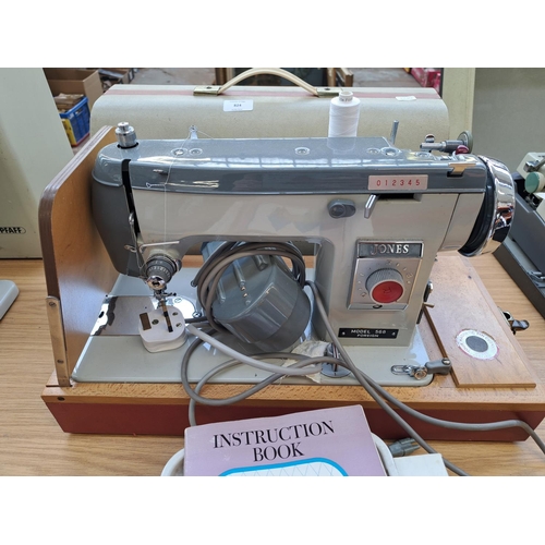 824 - A cased Jones 568 electric sewing machine with foot pedal, accessories and instruction manual