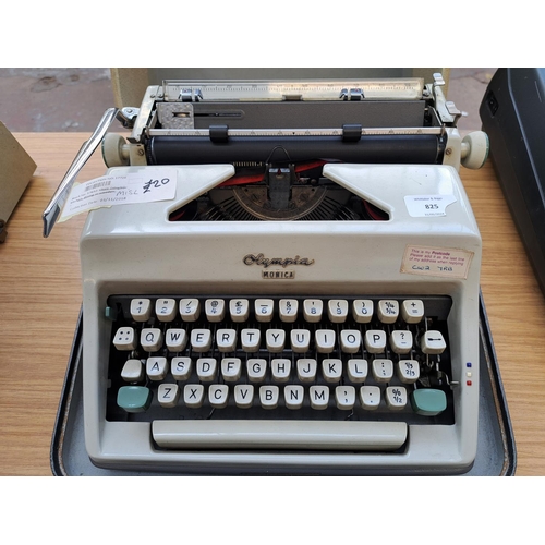 825 - A cased Olympia Monica portable typewriter