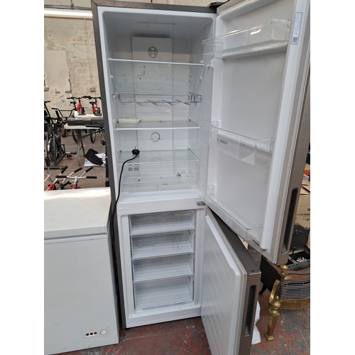 837A - A Bosch upright fridge freezer - approx. 184cm high