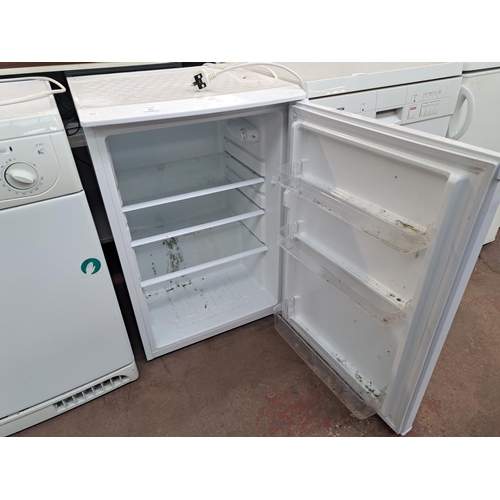 842 - A 55cm under counter fridge