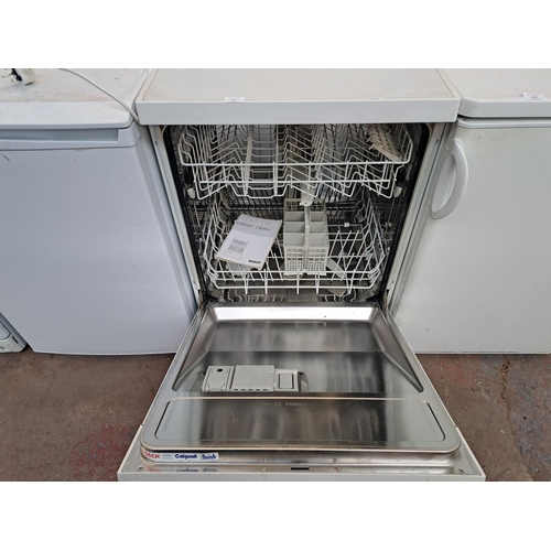 843 - A Bosch 60cm under counter dishwasher with instruction manual