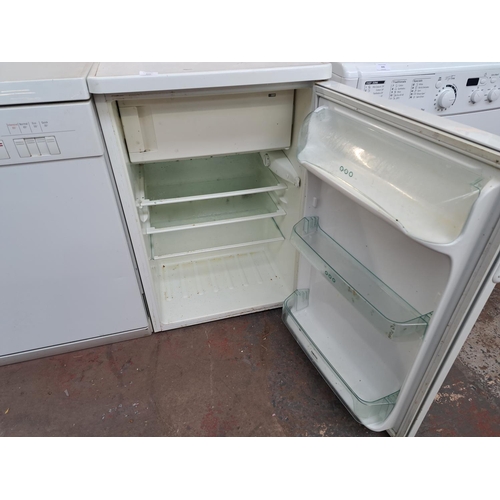 844 - A Zanussi 55cm under counter fridge