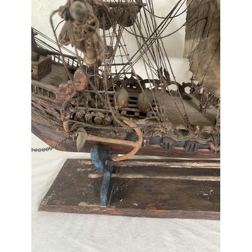 172 - A hand-painted resin and wood model ship on stand - approx. 120cm high x 156cm long