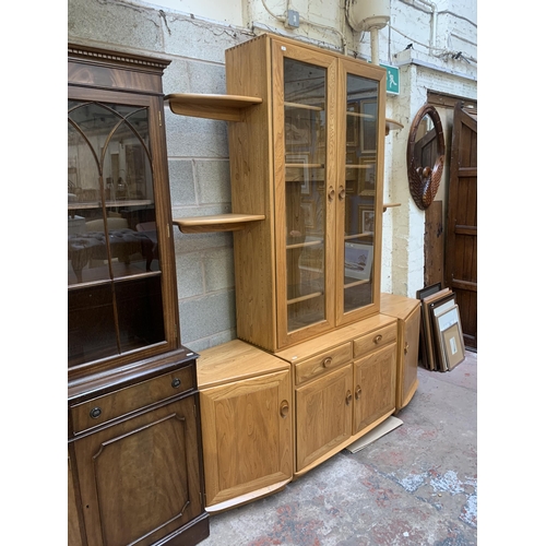 18 - An Ercol Windsor blonde elm display unit - approx. 214cm high x 181cm wide x 45cm deep