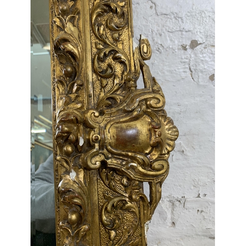 2 - A Rococo style gilt framed bevelled edge wall mirror - approx. 140cm high x 92cm wide