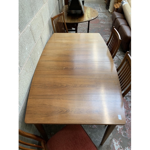 4 - A mid 20th century McIntosh teak extending dining table and six chairs - approx. 74cm high x 91cm wi... 