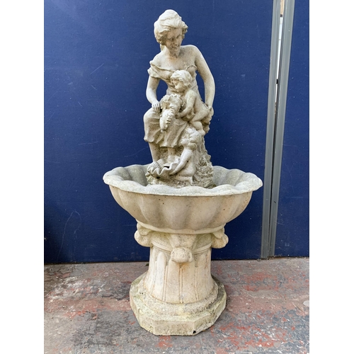 52 - A 19th century style stone effect fibreglass figural pedestal water fountain - approx. 130cm high x ... 