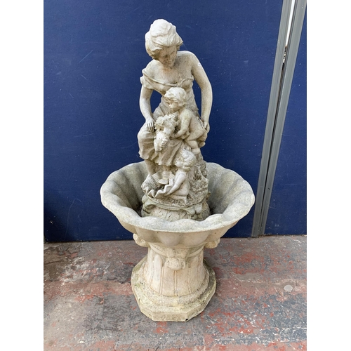 52 - A 19th century style stone effect fibreglass figural pedestal water fountain - approx. 130cm high x ... 