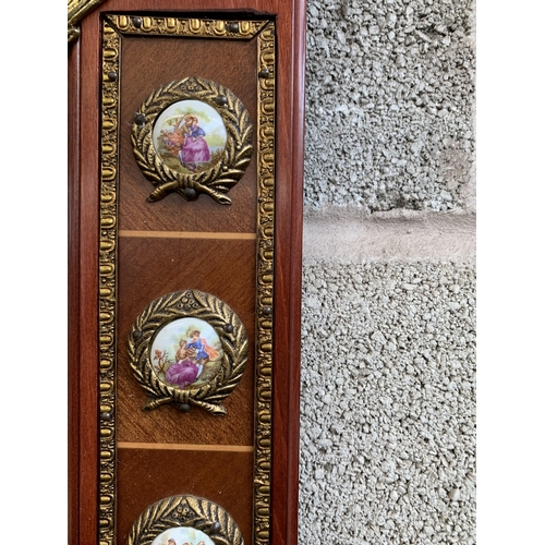 249 - A Louis XVI style mahogany and gilt framed wall mirror with porcelain plaques - approx. 87cm high x ... 