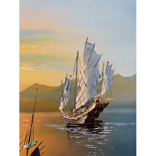 264 - A mid/late 20th century framed oriental acrylic on board of sailing ships - approx. 58cm high x 126c... 