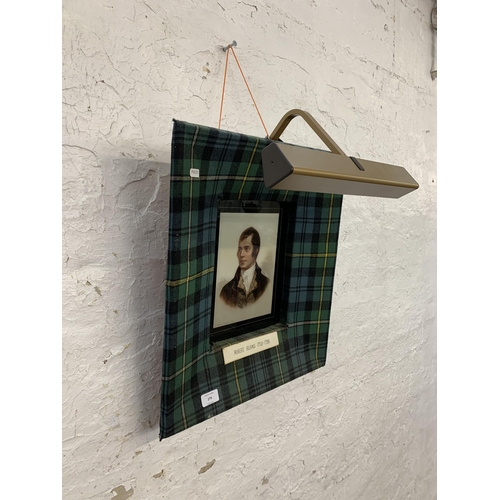 279 - A tartan fabric framed portrait print of Robert Burns (1759 - 1796) with picture light - approx. 50c... 