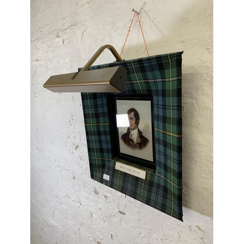 279 - A tartan fabric framed portrait print of Robert Burns (1759 - 1796) with picture light - approx. 50c... 