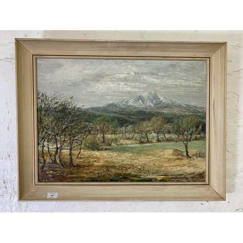 284 - A mid 20th century framed E. Chiverton landscape scene oil on board - approx. 59cm high x 77cm wide