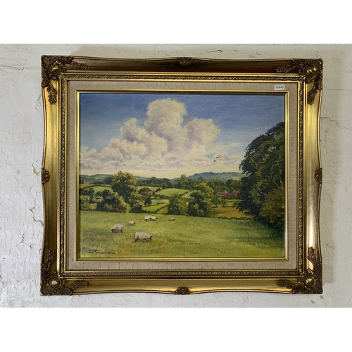 291 - A gilt framed Paul Robinson oil on board of Gawsworth - approx. 54cm high x 64cm wide