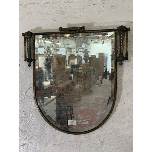 297 - An Art Deco metal framed bevelled edge wall mirror - approx. 48cm high x 48cm wide