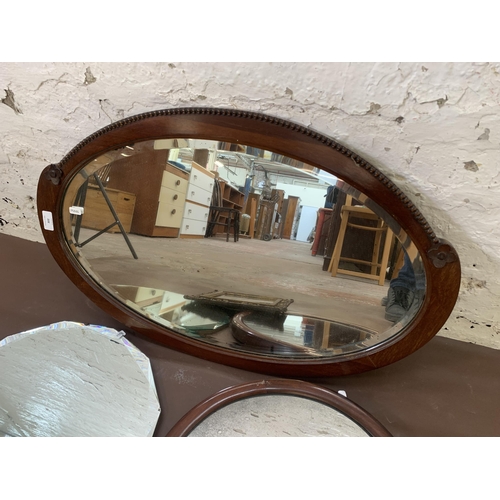 302 - Four various wall mirrors, two mahogany framed, one gilt framed and one frameless