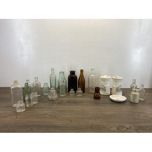 359 - A collection of ceramics and glassware to include vintage glass bottles, early 20th century stonewar... 