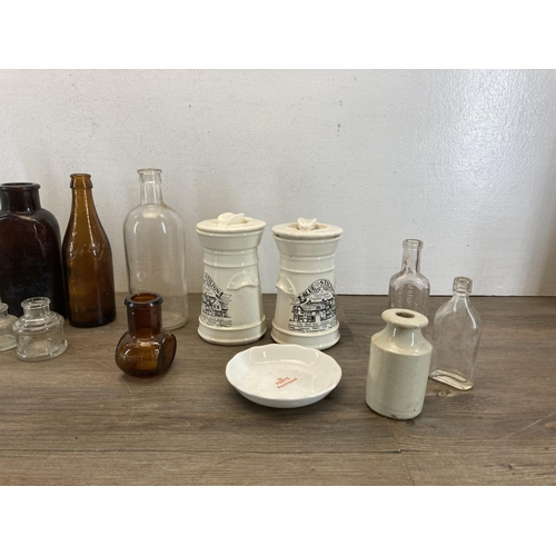 359 - A collection of ceramics and glassware to include vintage glass bottles, early 20th century stonewar... 