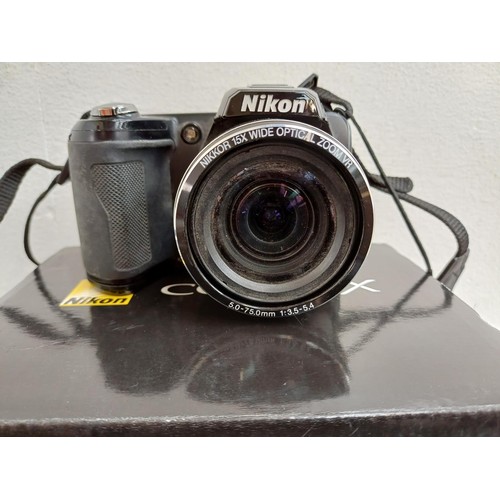 642 - Two Nikon Coolpix compact digital bridge cameras, one boxed L110 12.1mp with cable software disc and... 