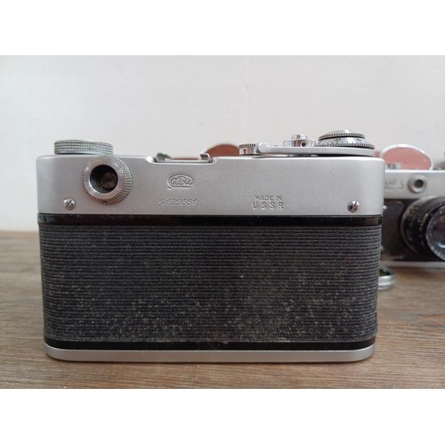 646 - Three cased FED 35mm screwmount rangefinder cameras, one FED 3b  fitted with Industar 61 2.8/52 lens... 