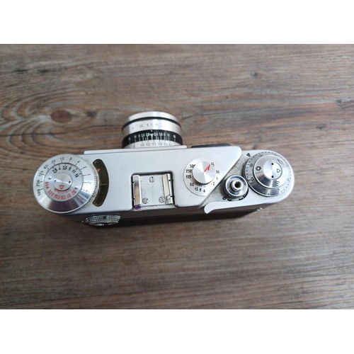 646 - Three cased FED 35mm screwmount rangefinder cameras, one FED 3b  fitted with Industar 61 2.8/52 lens... 